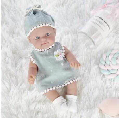 Пупс Pure Baby 25 см. в сером платье, шапочке, носочках JUNFA WJ-B9961